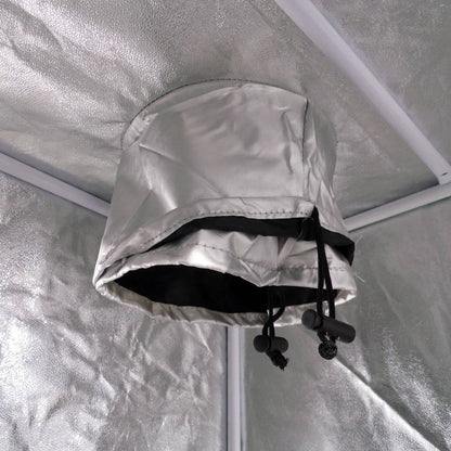 Sortie d’aération réglable avec cordon de serrage sur la chambre de culture Greencube G-Max 120, idéale pour ventilation contrôlée.
